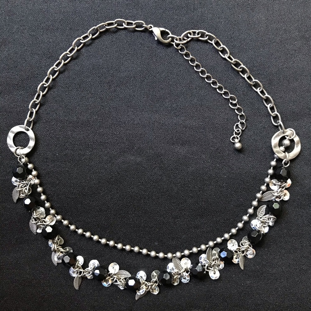 Black & metal jewelry with plastic beads & sequins